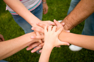 family-teamwork-hands
